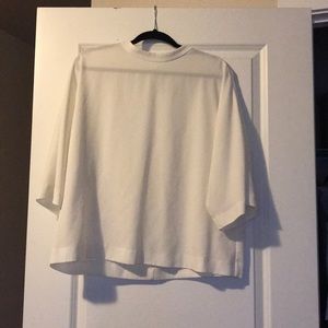 White cowl-neck blouse